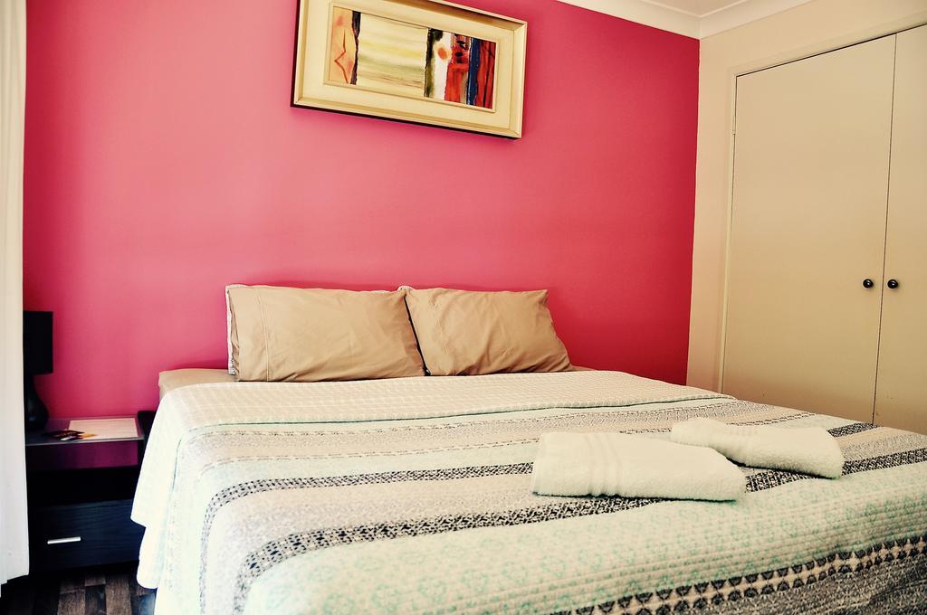 Tl Warmest Homestay Guldkusten Rum bild